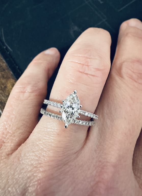 Oval diamond ring on hand