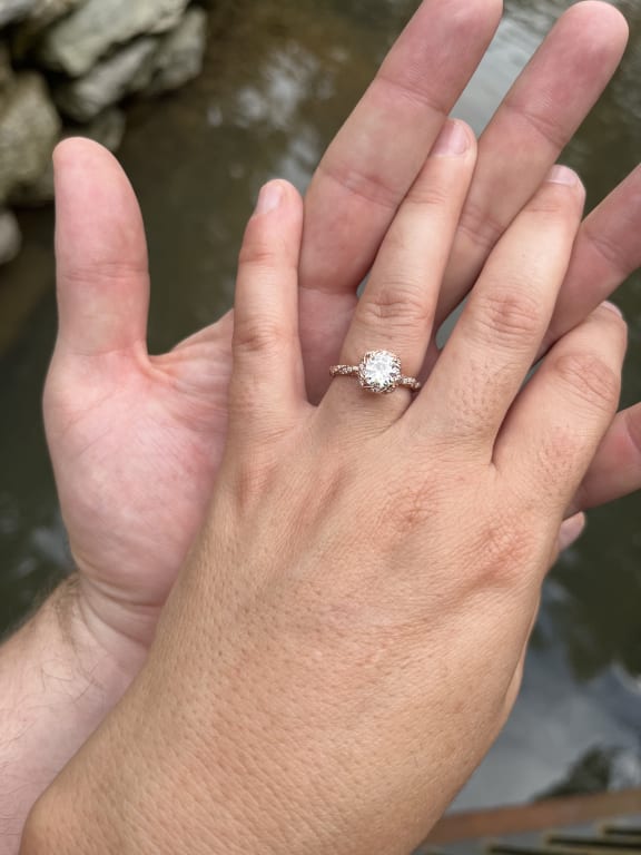 Oval diamond ring on hand