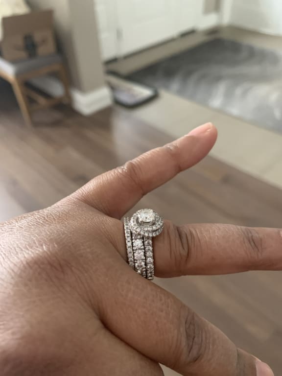 Oval diamond ring on hand