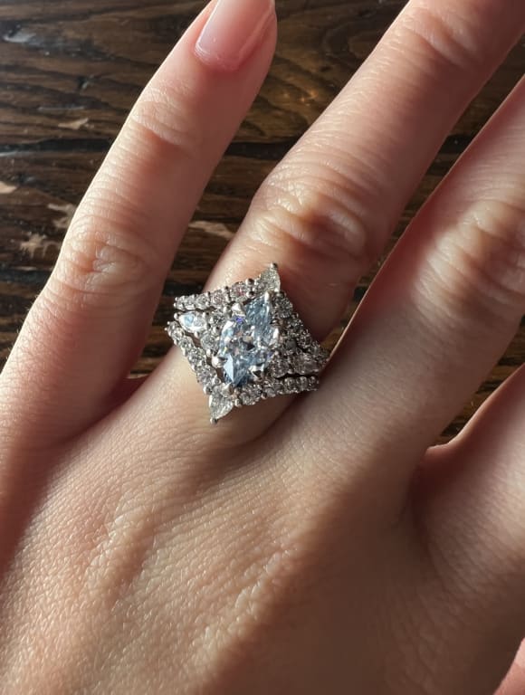 Oval diamond ring on hand