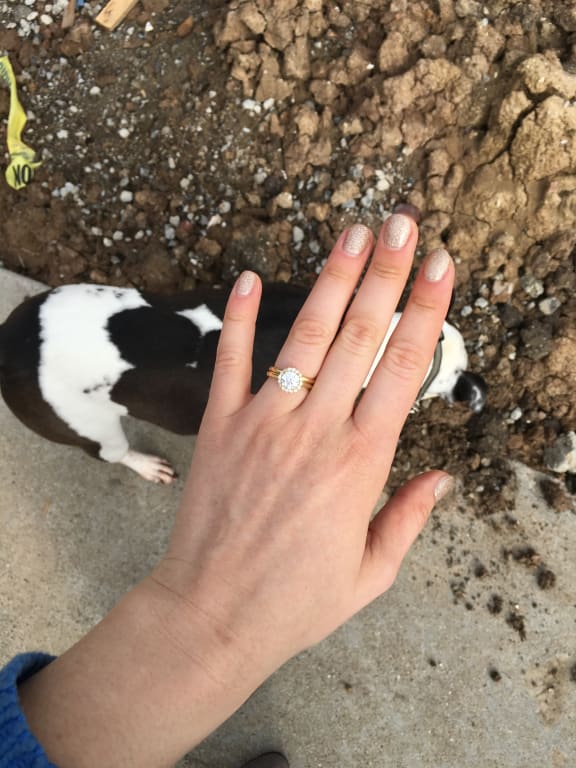 Oval diamond ring on hand
