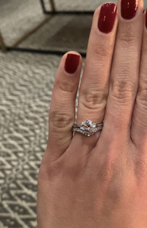 Oval diamond ring on hand