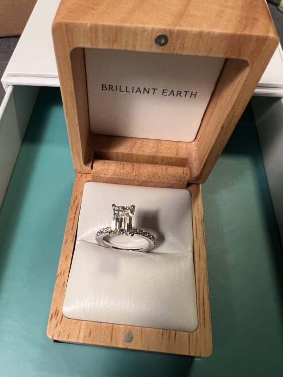Oval diamond ring on hand