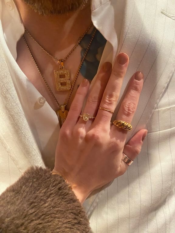 Oval diamond ring on hand