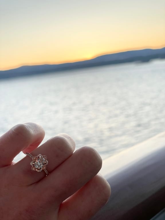 Oval diamond ring on hand