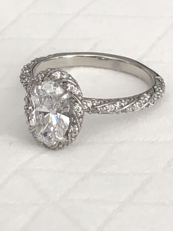 Oval diamond ring on hand