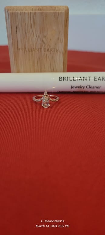 Oval diamond ring on hand