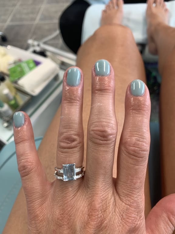 Oval diamond ring on hand