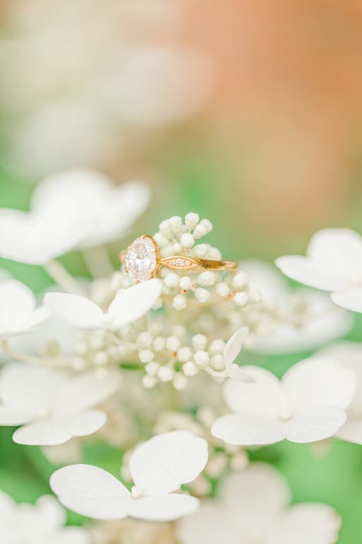 Oval diamond ring on hand