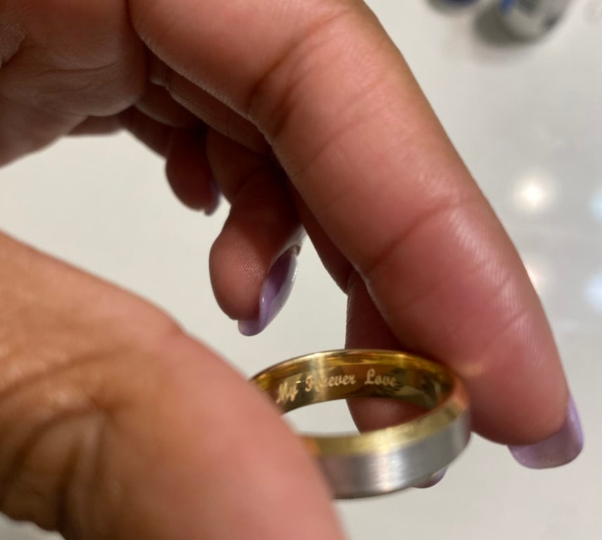 Oval diamond ring on hand