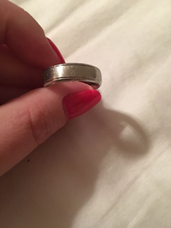 Oval diamond ring on hand