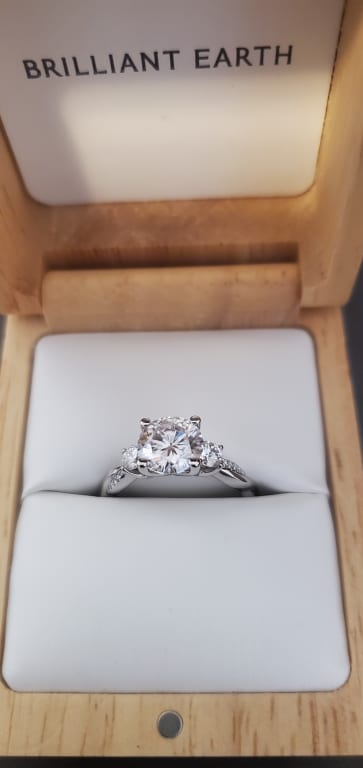 Oval diamond ring on hand