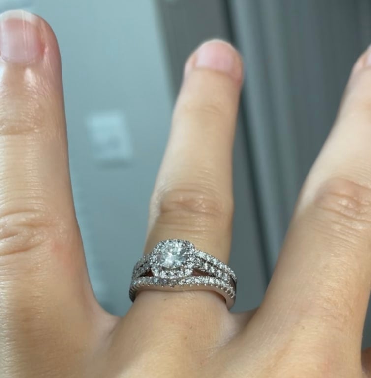 Oval diamond ring on hand