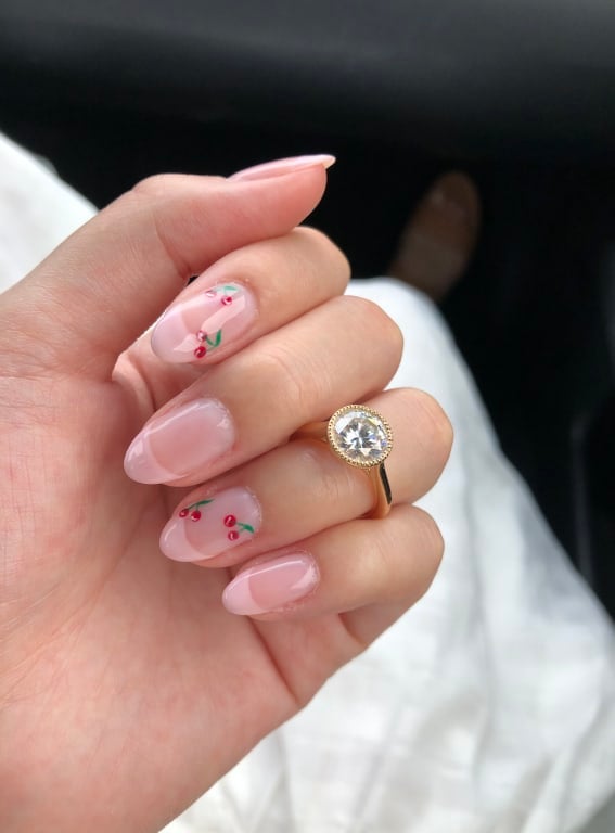 Oval diamond ring on hand