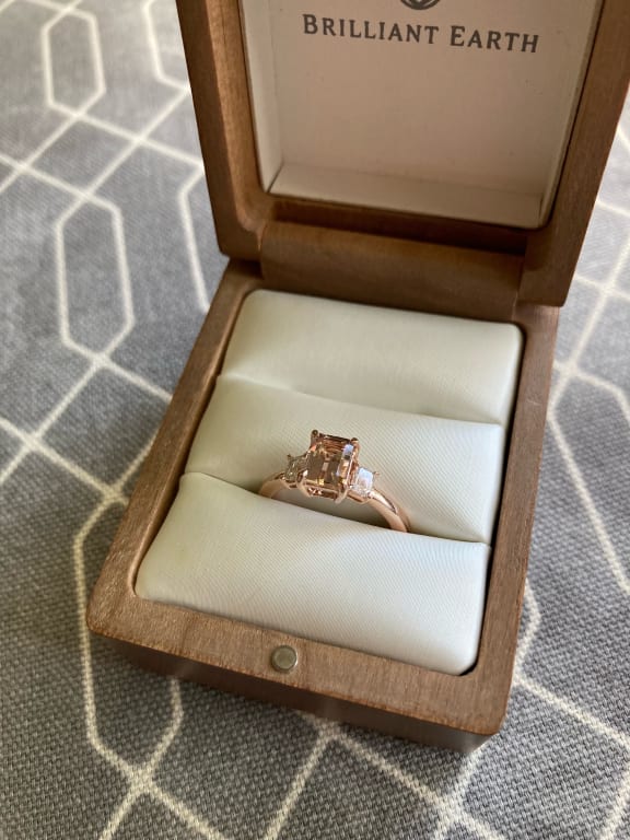 Oval diamond ring on hand