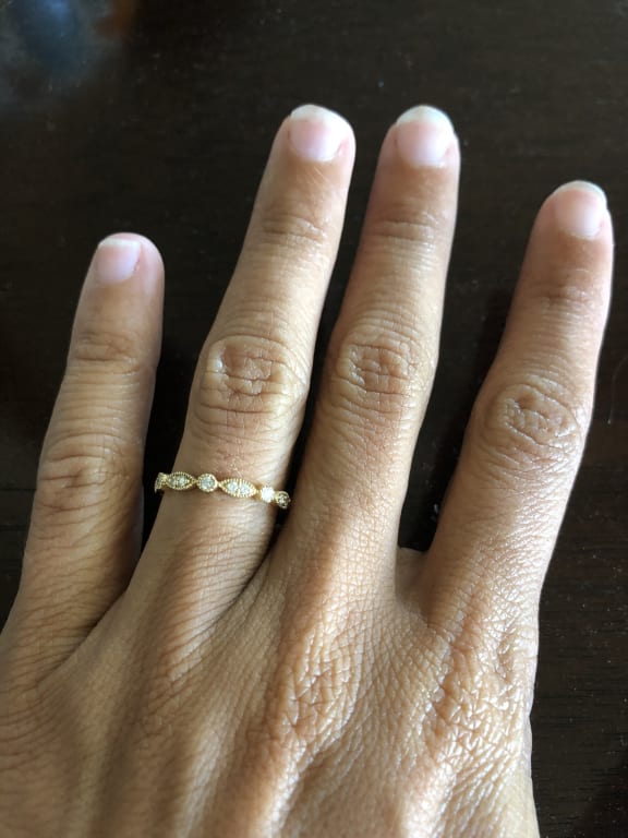 Oval diamond ring on hand