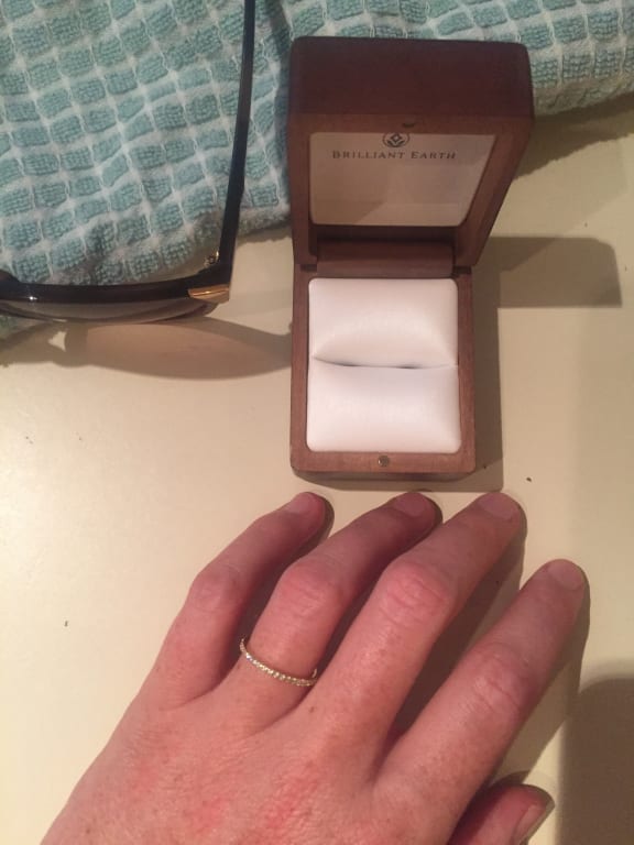 Oval diamond ring on hand