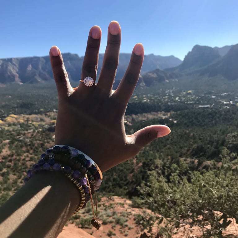 Oval diamond ring on hand