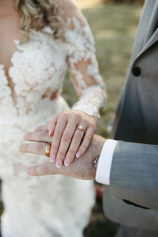 Oval diamond ring on hand
