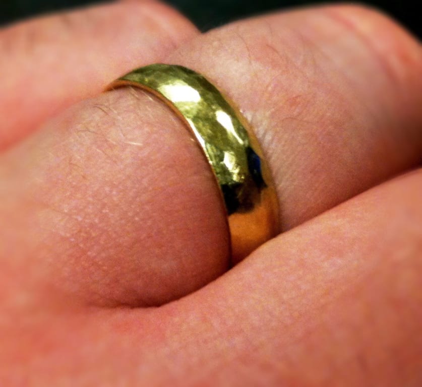 Oval diamond ring on hand