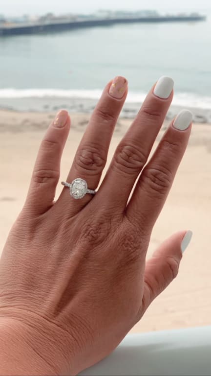 Oval diamond ring on hand