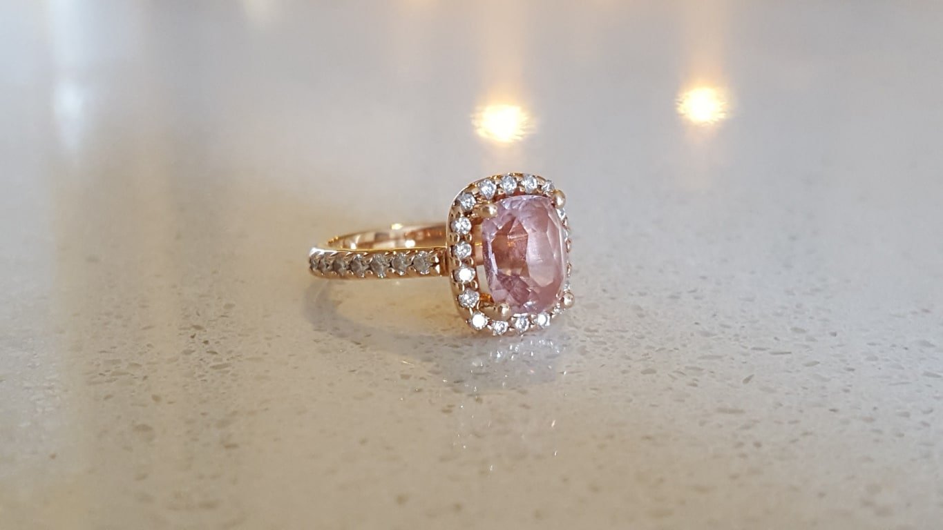 Oval diamond ring on hand
