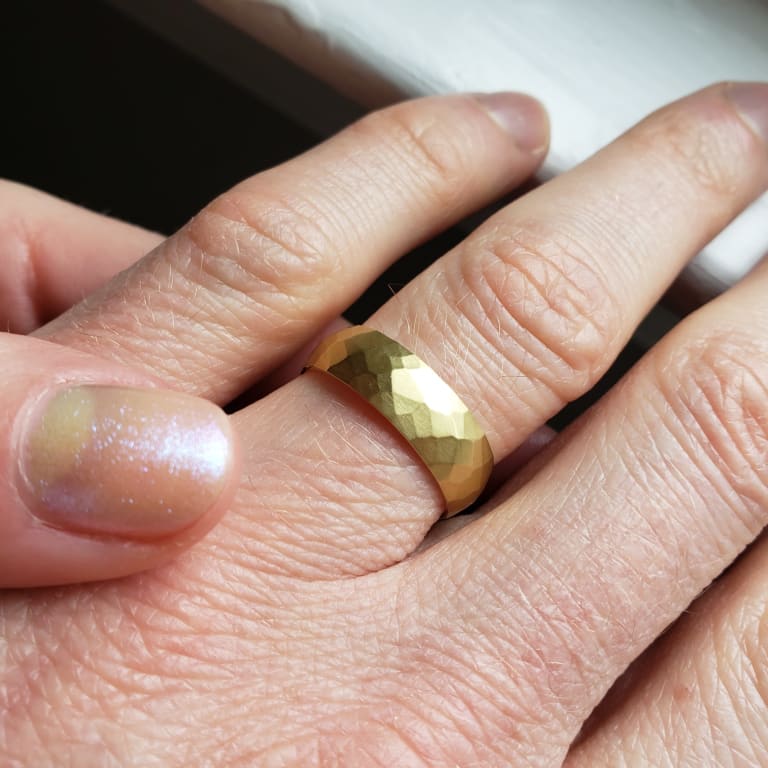 Oval diamond ring on hand