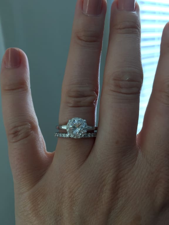 Oval diamond ring on hand