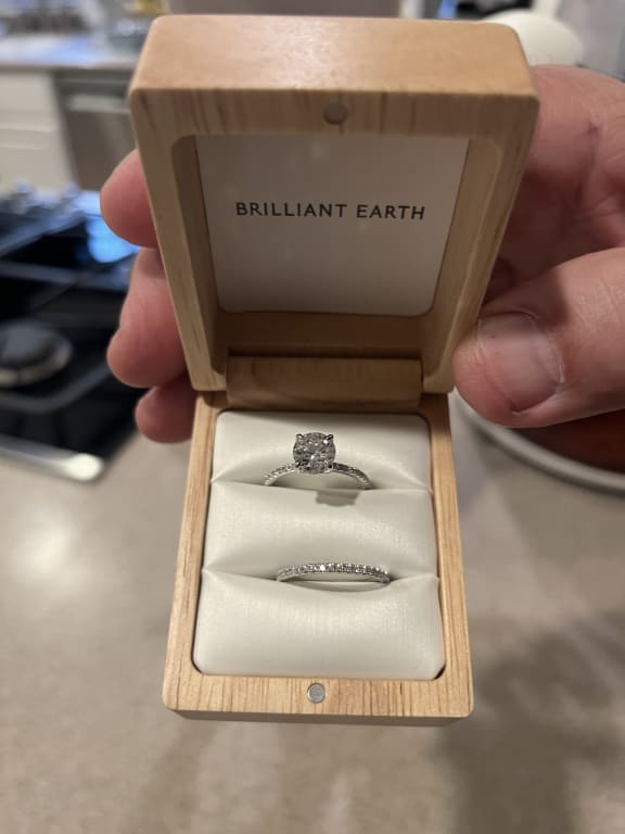 Oval diamond ring on hand