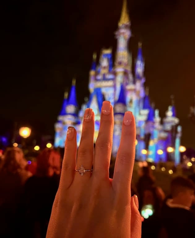 Oval diamond ring on hand