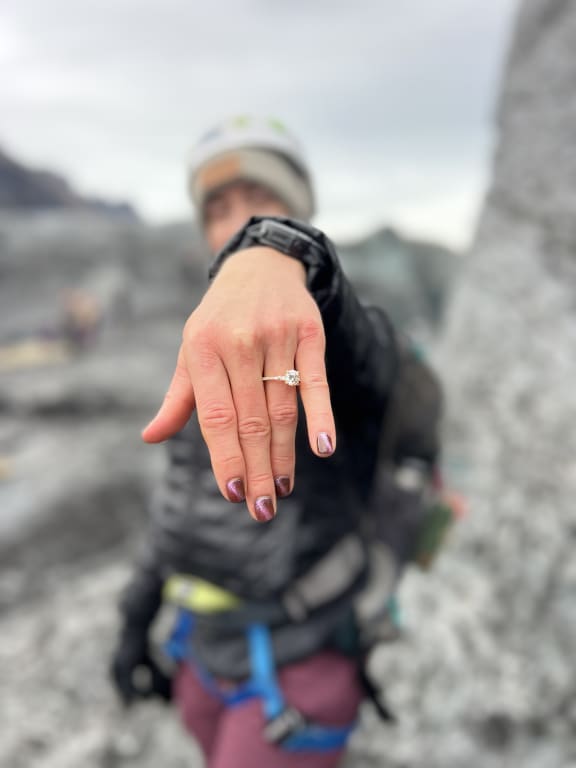 Oval diamond ring on hand