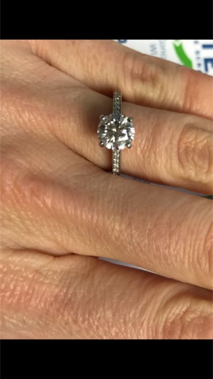 Oval diamond ring on hand