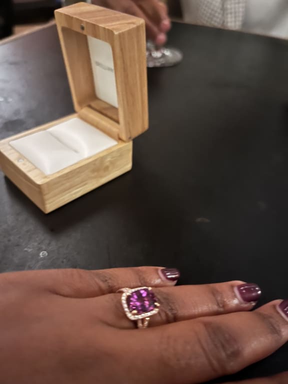 Oval diamond ring on hand