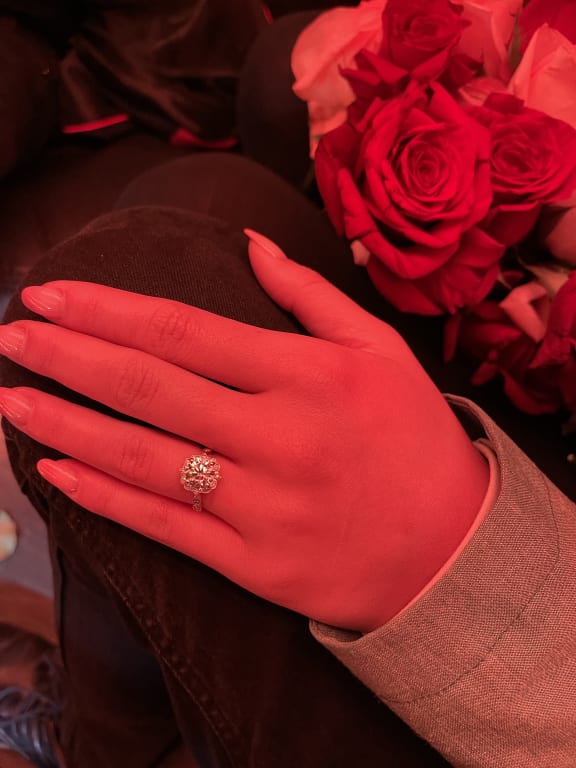 Oval diamond ring on hand