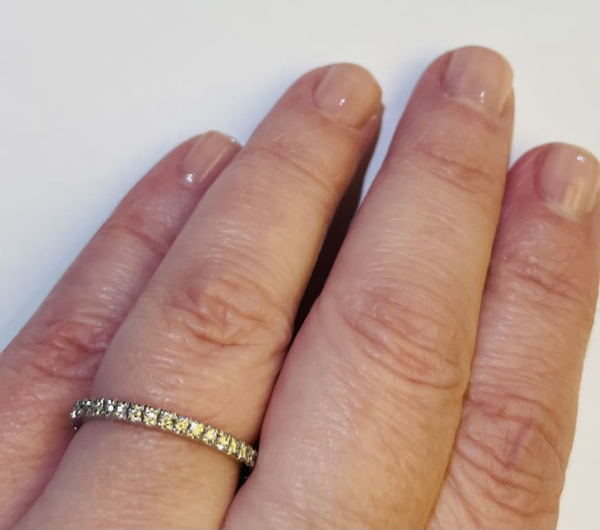 Oval diamond ring on hand