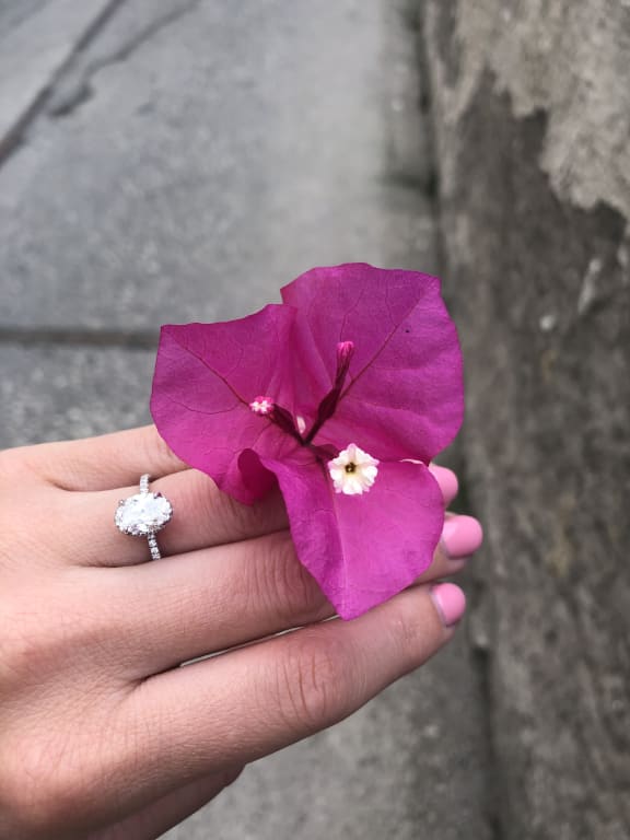 Oval diamond ring on hand