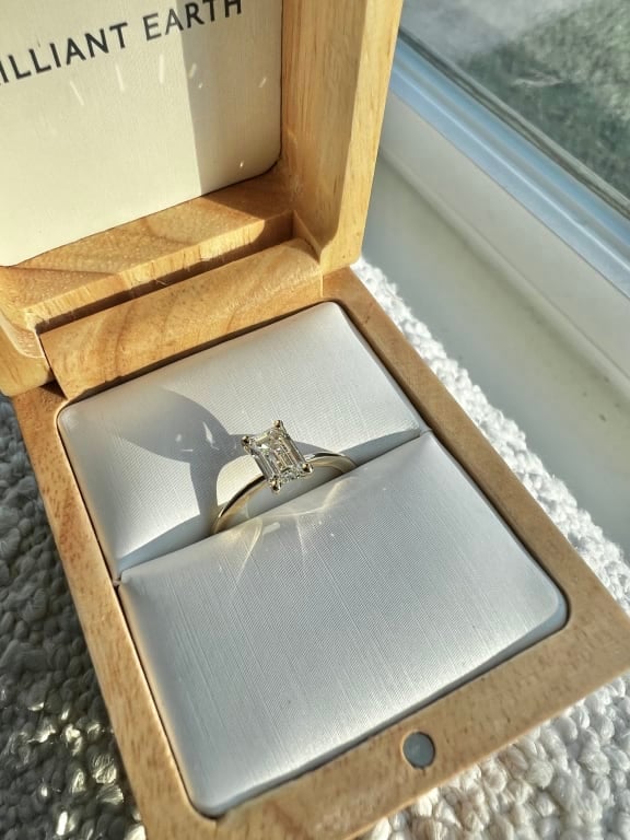Oval diamond ring on hand