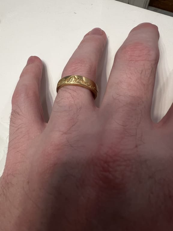 Oval diamond ring on hand