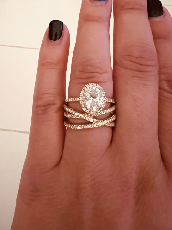Oval diamond ring on hand