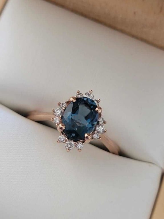 Oval diamond ring on hand