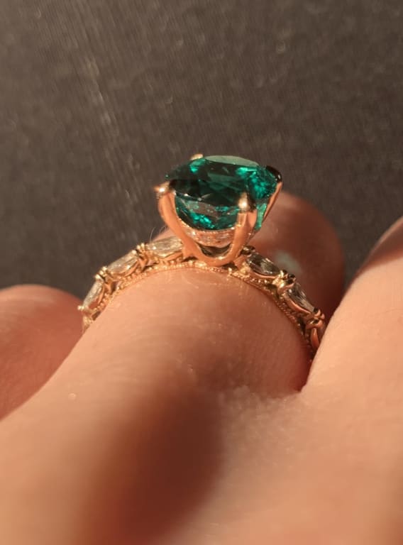 Oval diamond ring on hand
