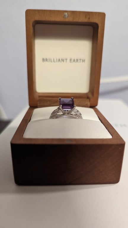 Oval diamond ring on hand