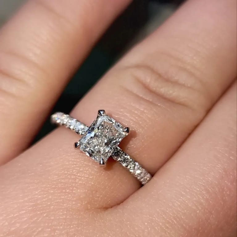 Oval diamond ring on hand