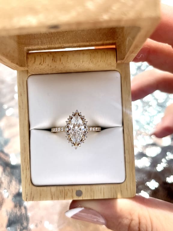 Oval diamond ring on hand