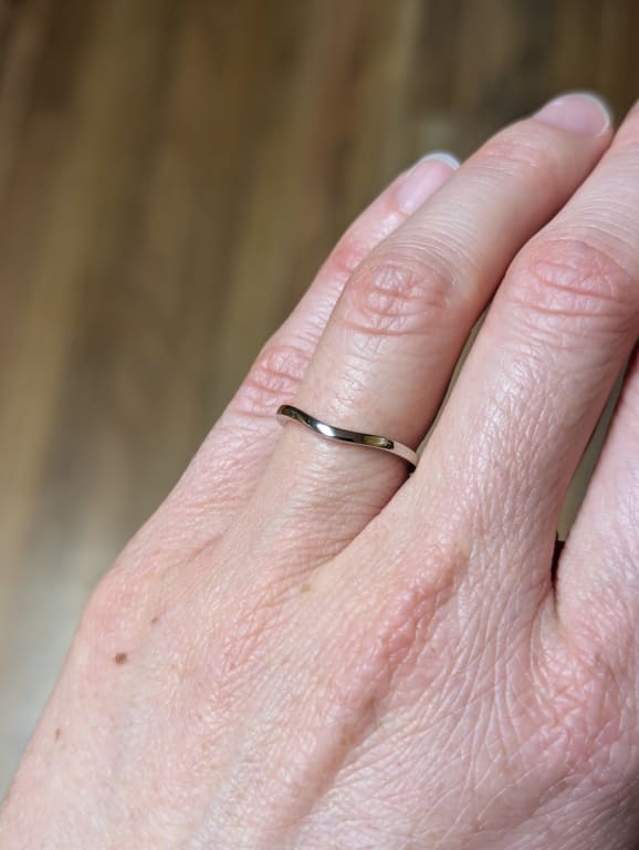 Oval diamond ring on hand