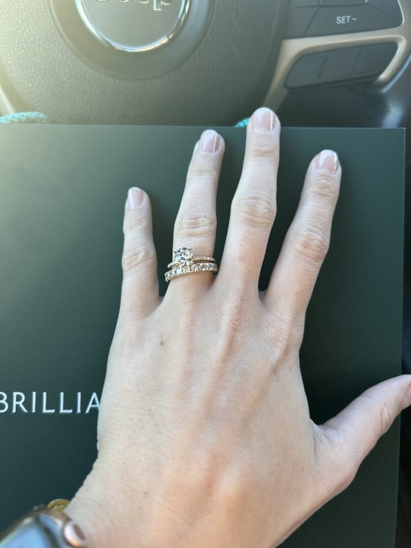 Oval diamond ring on hand