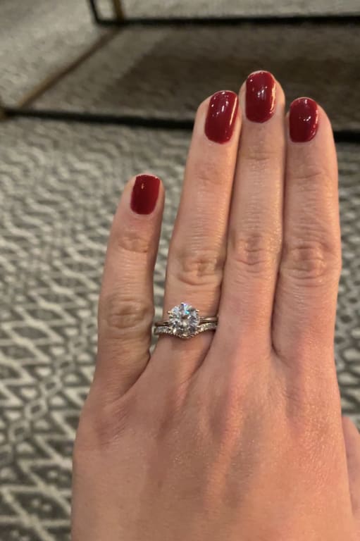 Oval diamond ring on hand