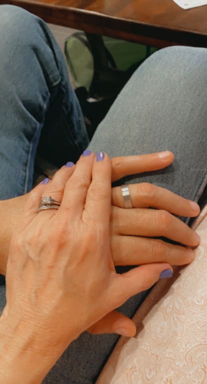Oval diamond ring on hand