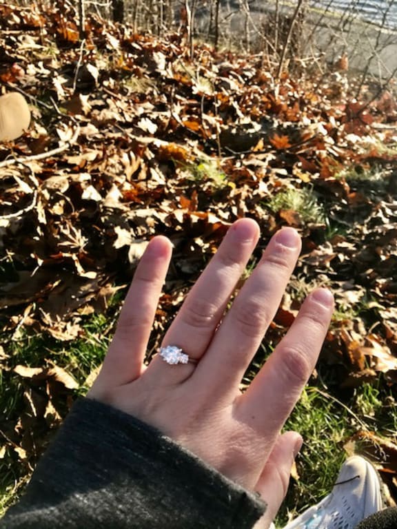 Oval diamond ring on hand
