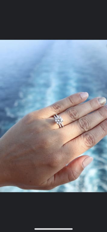 Oval diamond ring on hand